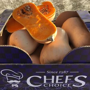 A selection of freshly picked butternut pumpkins laid in a Veg-UK Chefs Choice crate.